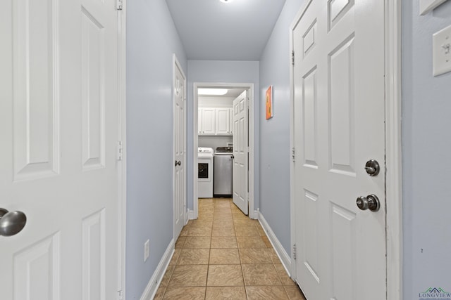 5201 Whitaker, Longview, TX 75605 - corridor featuring independent washer and dryer and light tile patterned flooring