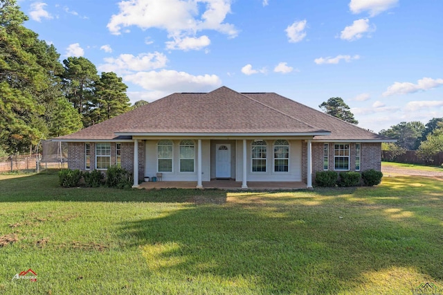 ranch-style house with a front yard