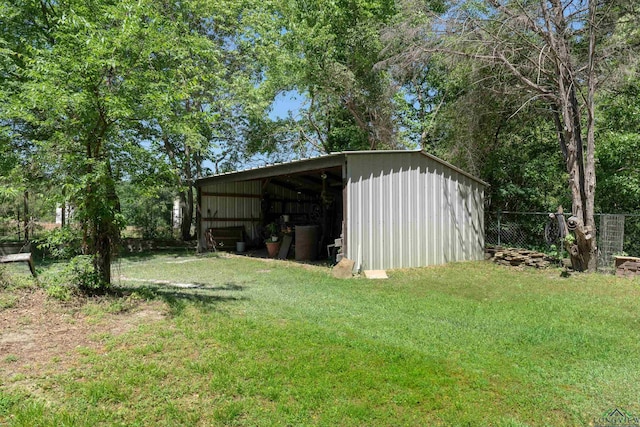 exterior space with a yard and fence