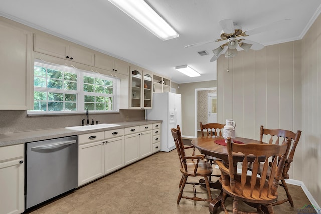 kitchen featuring a sink, white fridge with ice dispenser, glass insert cabinets, dishwasher, and light floors
