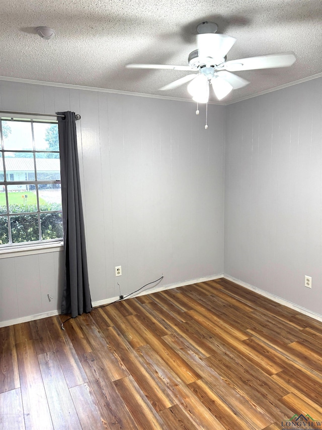 909 Stewart St, Atlanta, TX 75551 - spare room with a textured ceiling, hardwood / wood-style flooring, a ceiling fan, and ornamental molding
