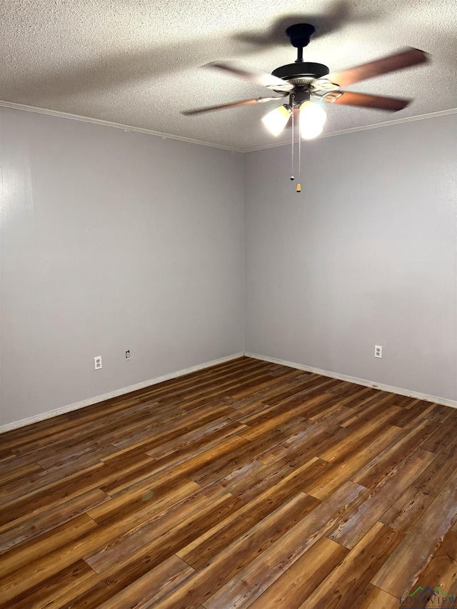 909 Stewart St, Atlanta, TX 75551 - empty room with a ceiling fan, dark wood finished floors, a textured ceiling, and ornamental molding