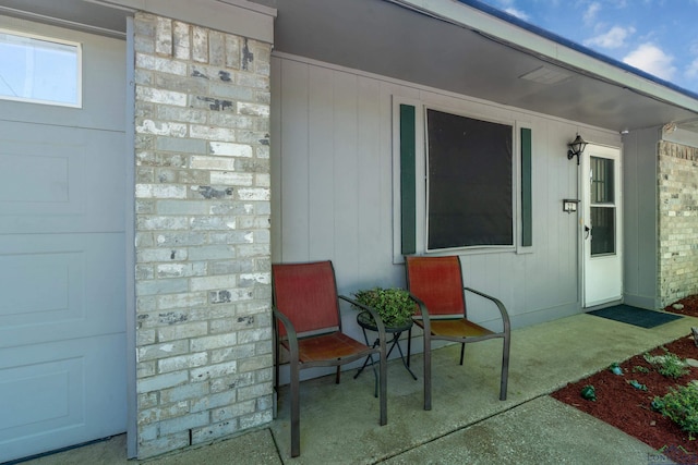 doorway to property with stone siding