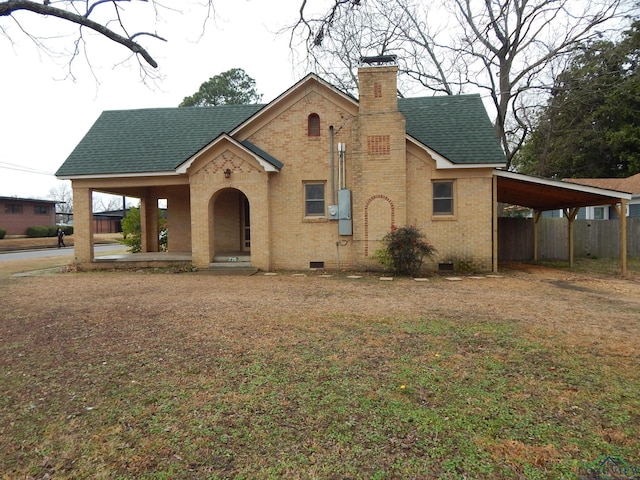 view of front of house with a carport