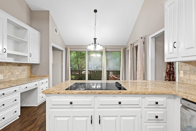 kitchen with white cabinetry, tasteful backsplash, decorative light fixtures, lofted ceiling, and black electric stovetop