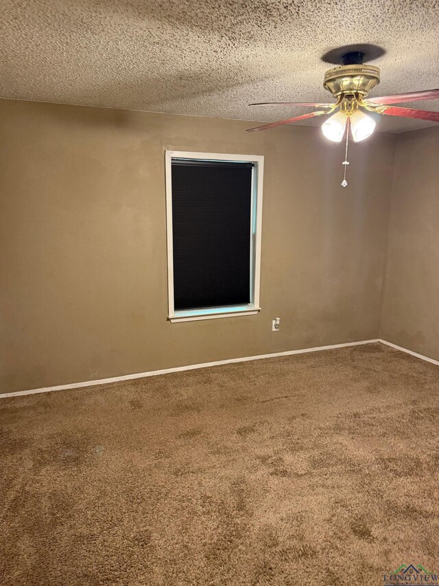 206 Syble Ln, Longview, TX 75605 - spare room with carpet flooring, a ceiling fan, and a textured ceiling