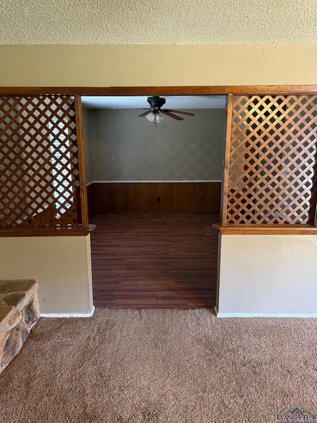206 Syble Ln, Longview, TX 75605 - detailed view of ceiling fan, carpet floors, and wood finished floors