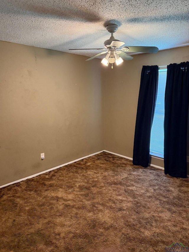 206 Syble Ln, Longview, TX 75605 - empty room with carpet flooring, a ceiling fan, and a textured ceiling