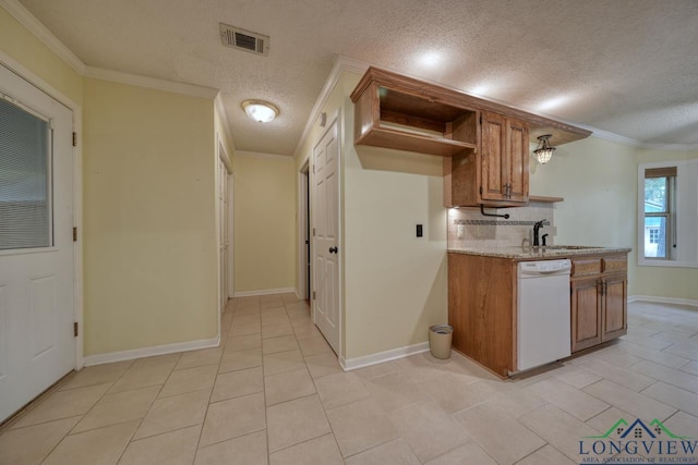 kitchen with sink, a textured ceiling, ornamental molding, white dishwasher, and backsplash