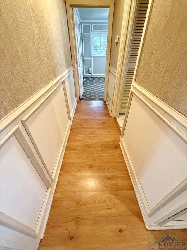 corridor featuring light hardwood / wood-style floors