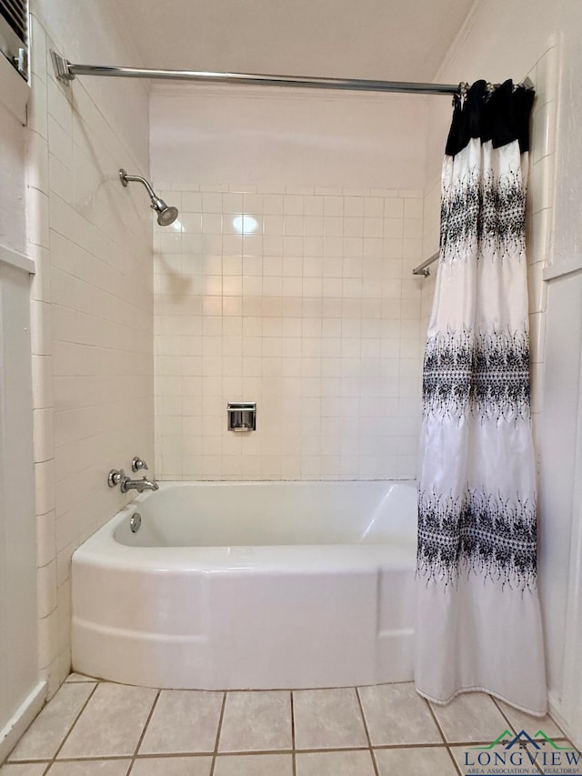 bathroom featuring tile patterned floors and shower / tub combo