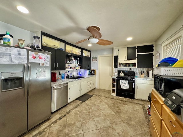 1009 Willow Springs Dr, Longview, TX 75604 - kitchen featuring black appliances, open shelves, a ceiling fan, backsplash, and recessed lighting