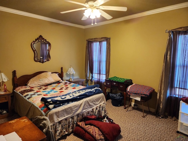 bedroom with carpet floors, ornamental molding, and ceiling fan