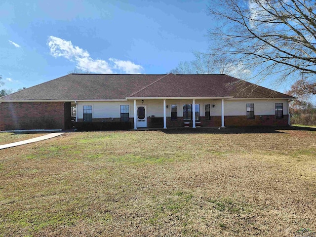 ranch-style house featuring a front lawn