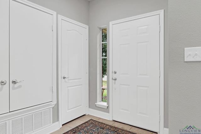 view of tiled foyer