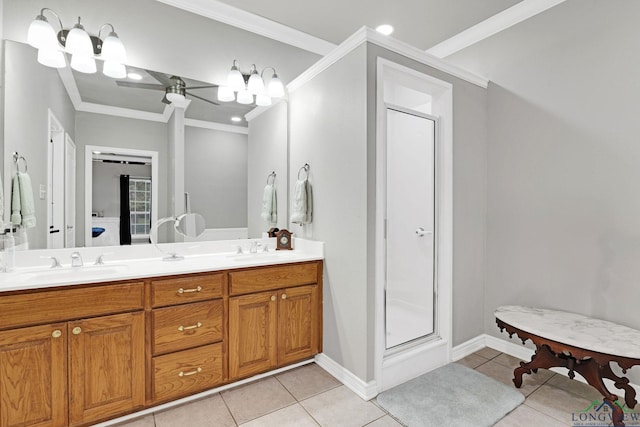 bathroom with tile patterned flooring, vanity, and ornamental molding