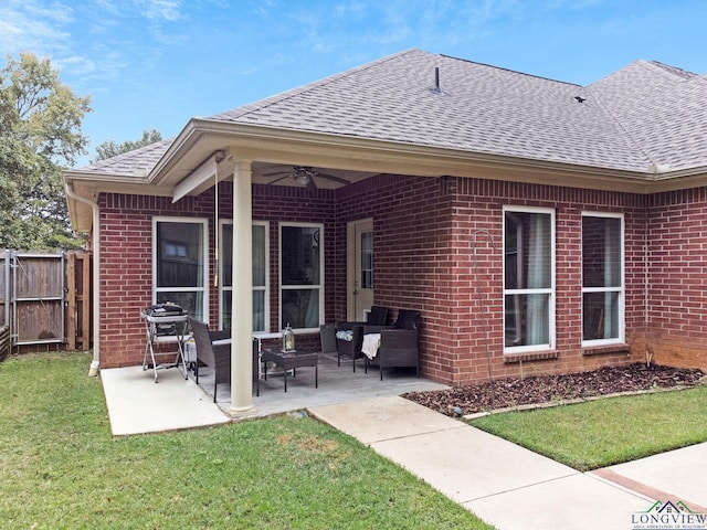 back of house with a lawn, ceiling fan, a patio area, and an outdoor hangout area