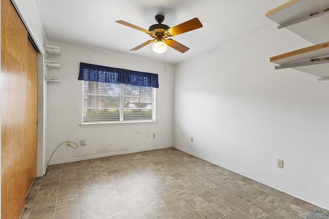 spare room featuring ceiling fan