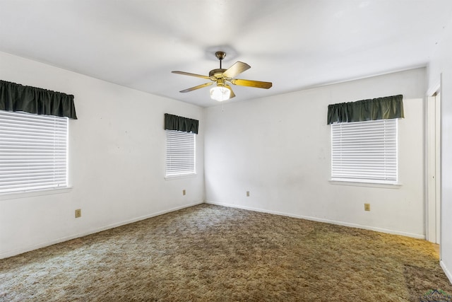 unfurnished room featuring carpet floors and ceiling fan