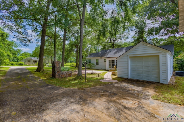 15 Rockwall Dr, Longview, TX 75604 - ranch-style house with driveway and an attached garage