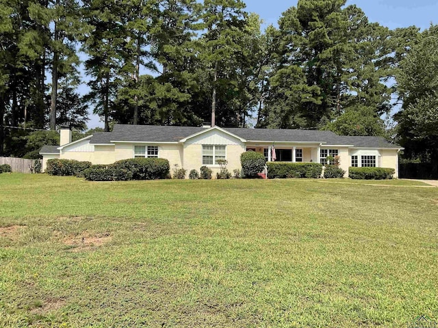 ranch-style house with a front yard