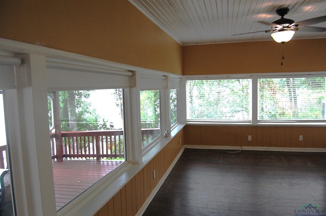 unfurnished sunroom featuring ceiling fan and wooden ceiling