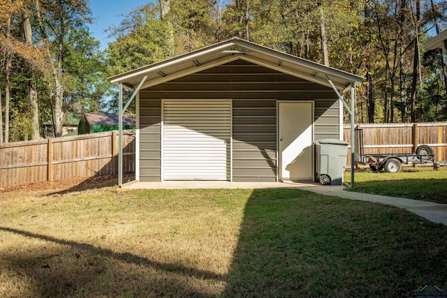 view of outdoor structure featuring a yard