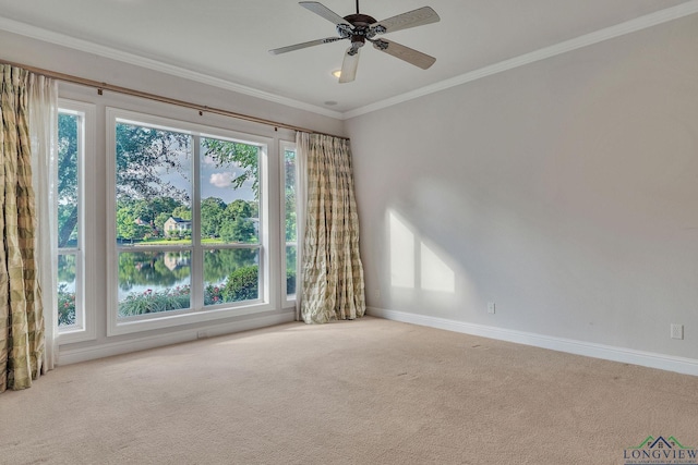 1719 Hg Mosley Pkwy, Longview, TX 75604 - empty room featuring carpet, baseboards, ceiling fan, and ornamental molding