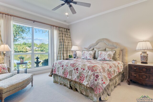 1719 Hg Mosley Pkwy, Longview, TX 75604 - carpeted bedroom featuring multiple windows, crown molding, and a ceiling fan