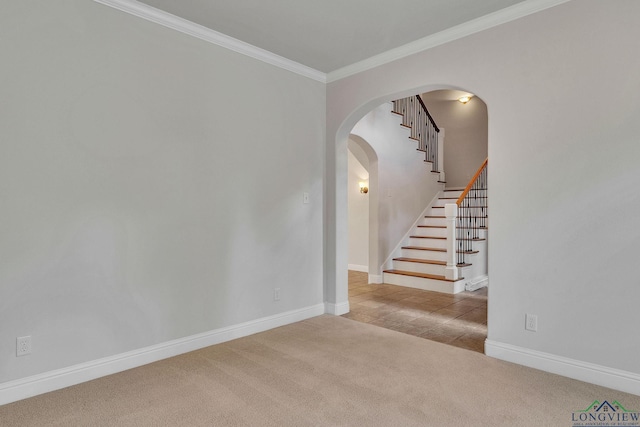 1719 Hg Mosley Pkwy, Longview, TX 75604 - living area featuring light colored carpet, ceiling fan, baseboards, and crown molding