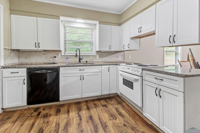 kitchen with electric range, dishwasher, white cabinets, stone countertops, and sink