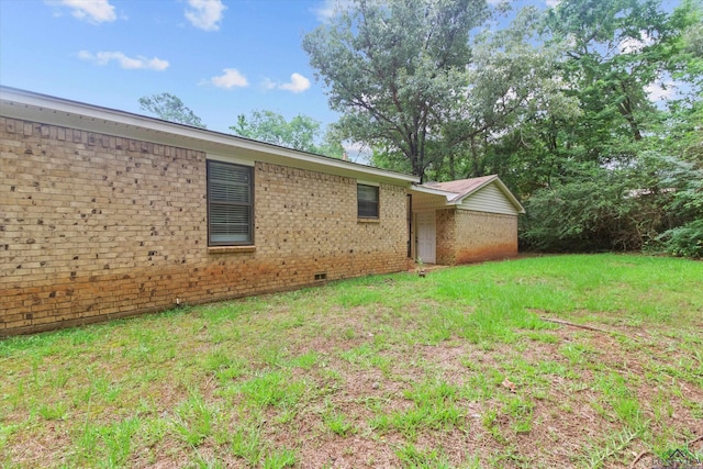 view of property exterior featuring a yard