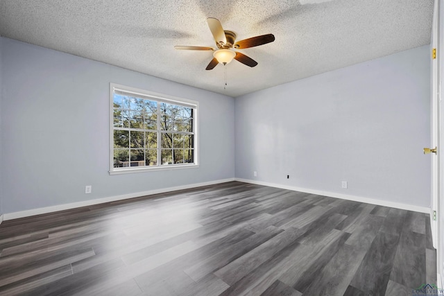 unfurnished room featuring dark hardwood / wood-style floors, ceiling fan, and a textured ceiling