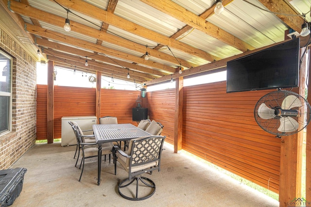 view of patio featuring ceiling fan