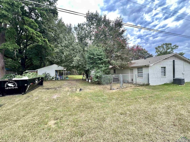 view of yard featuring central AC