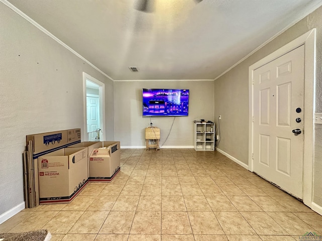 living room featuring light tile patterned floors and ornamental molding