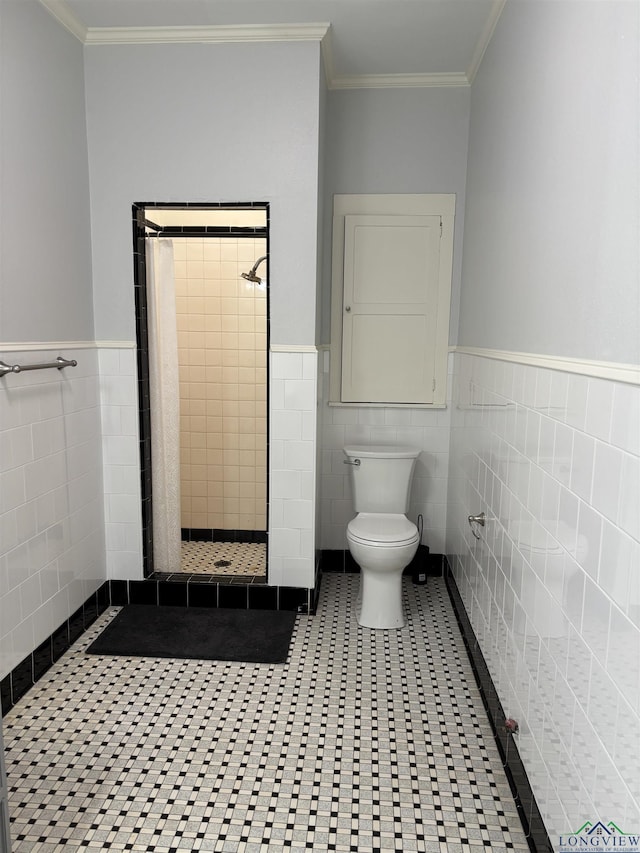 bathroom with tile patterned floors, toilet, tile walls, and walk in shower