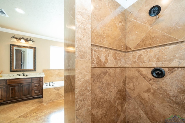 bathroom with vanity, a relaxing tiled tub, and ornamental molding