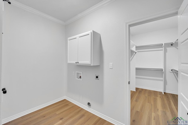 clothes washing area featuring hookup for an electric dryer, hookup for a washing machine, cabinets, crown molding, and light hardwood / wood-style flooring