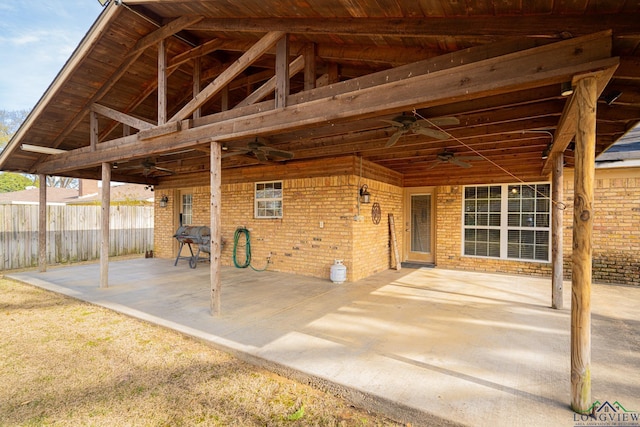 view of patio featuring ceiling fan