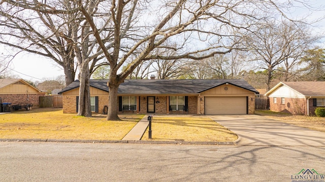 ranch-style house featuring a garage