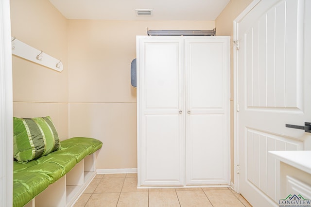 bathroom with tile patterned floors