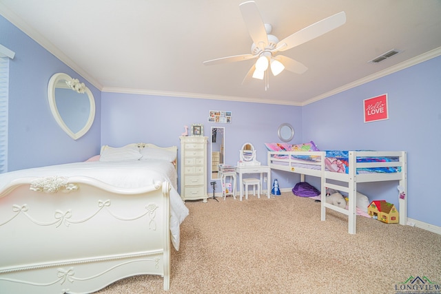 carpeted bedroom with ceiling fan and ornamental molding