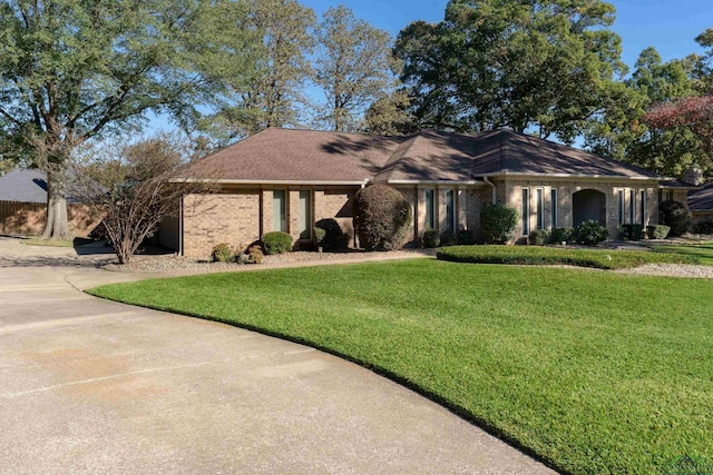 ranch-style house with a front yard