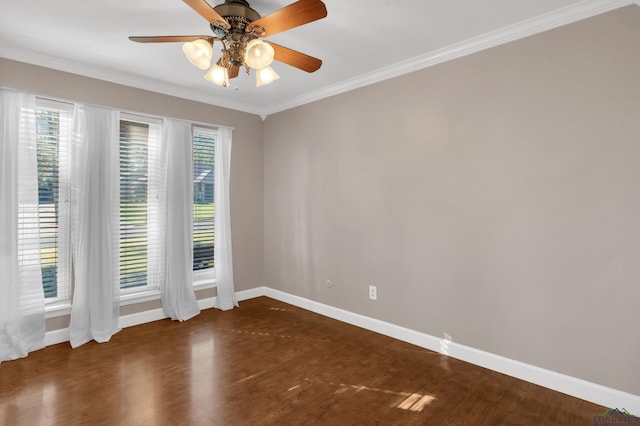 unfurnished room with ceiling fan, dark hardwood / wood-style floors, crown molding, and a wealth of natural light