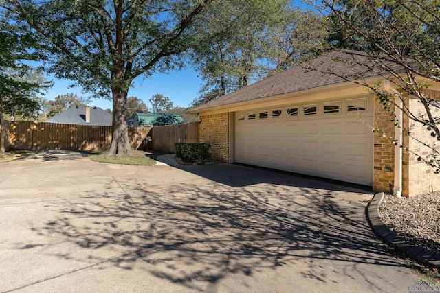 ranch-style house featuring a garage