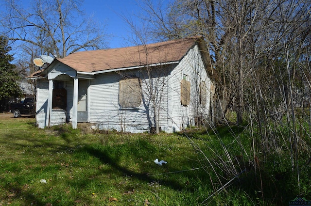 exterior space with a front yard