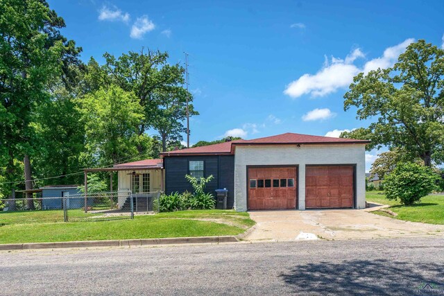 300 Hailey Dr, Longview, TX 75602 - ranch-style home featuring an attached garage and driveway