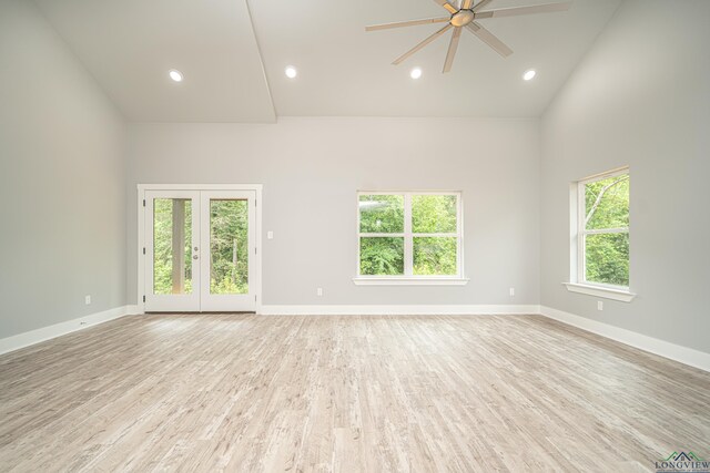 126 Lakeway Ln, Longview, TX 75604 - unfurnished room featuring high vaulted ceiling, baseboards, a ceiling fan, and light wood-style flooring
