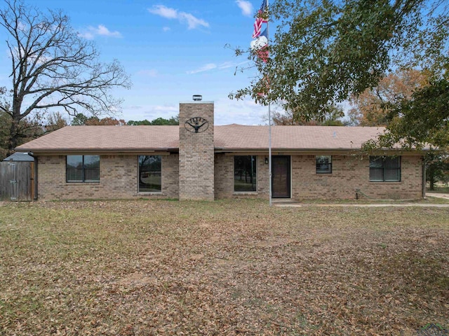 single story home with a front yard